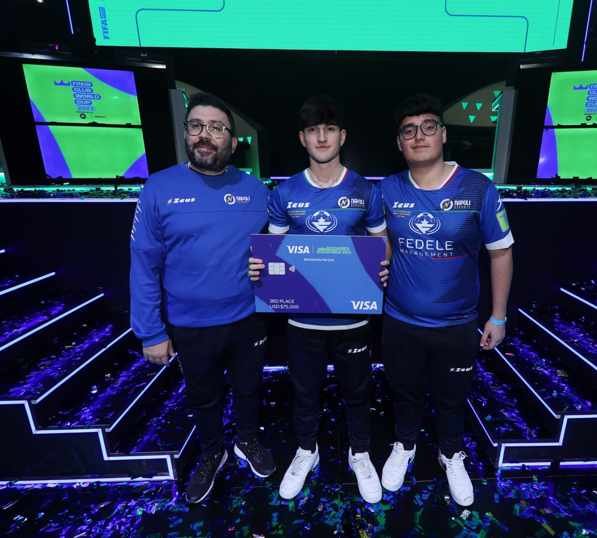 RIYADH, SAUDI ARABIA - JULY 09: Luca Guarino (Luconegua) and Daniele  Culiers (DaniHulk16) of Napoli eSports   receive their VISA prize after finishing third in the FIFAe Club World Cup 2023 on July 09, 2023 in Riyadh, Saudi Arabia. (Photo by Joosep Martinson - FIFA/FIFA via Getty Images)